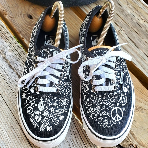 white vans with drawings